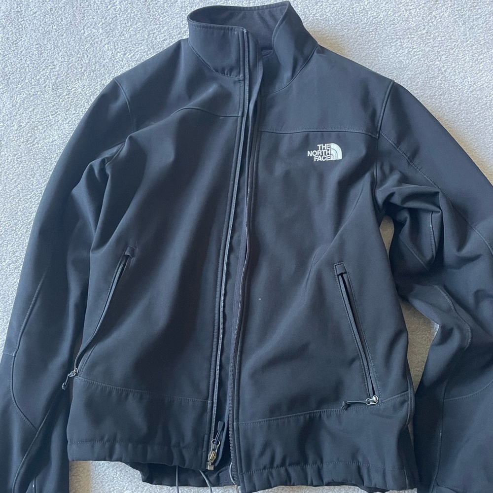 North face full zip jacket. Really comfortable furry inside.
